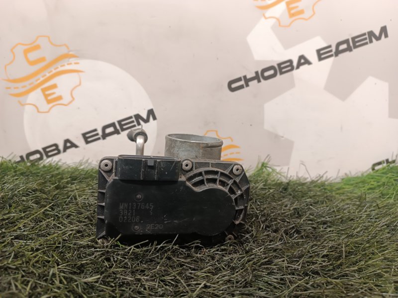 Дроссельная заслонка
